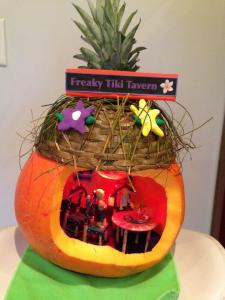 I used a pineapple and a wicker basket to fashion the rooftop. 